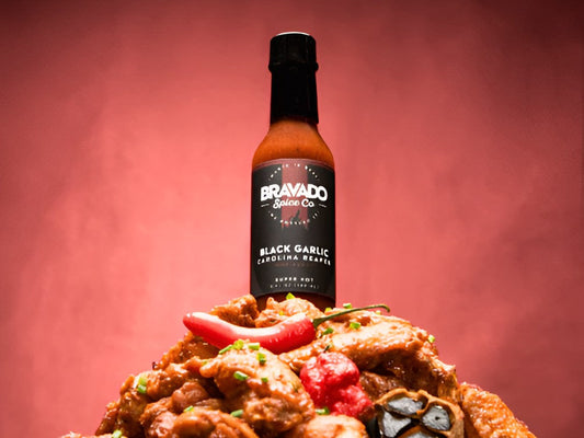 A bottle of Black Garlic & Carolina Reaper Hot Sauce. 